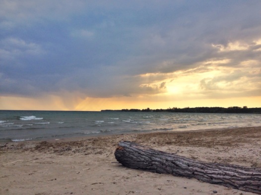 We watched the rain move across Lake Ontario in the near distance.