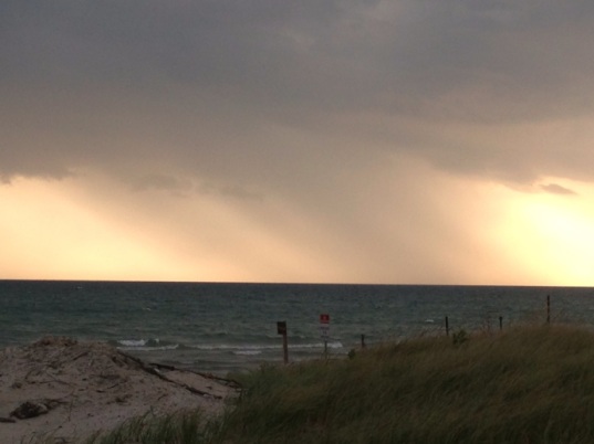 Watching the rain intensify as it moved across Lake Ontario in the near distance.